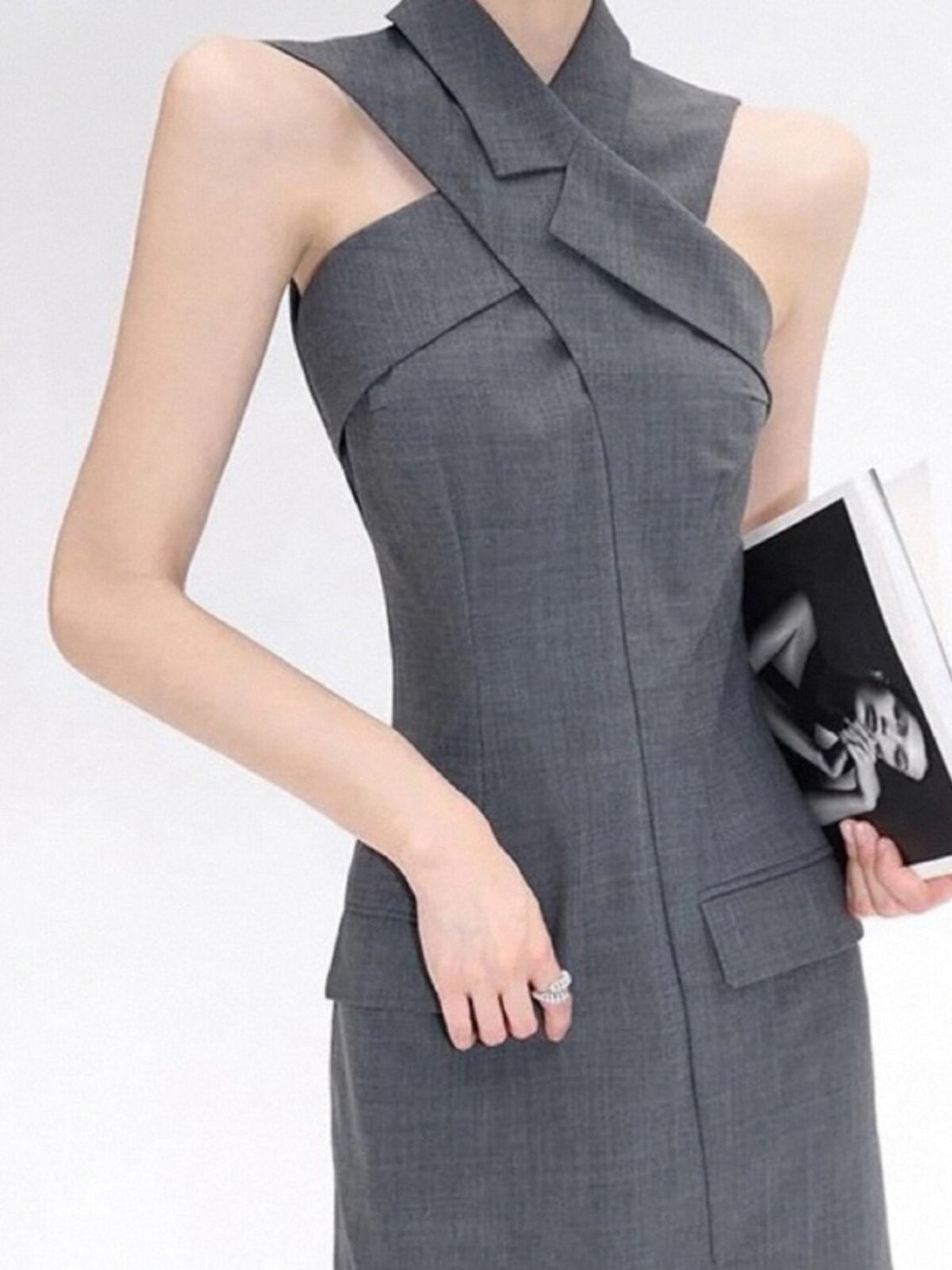 Dark grey cross-halter sleeveless blazer midi dress with notched lapels and flap pockets