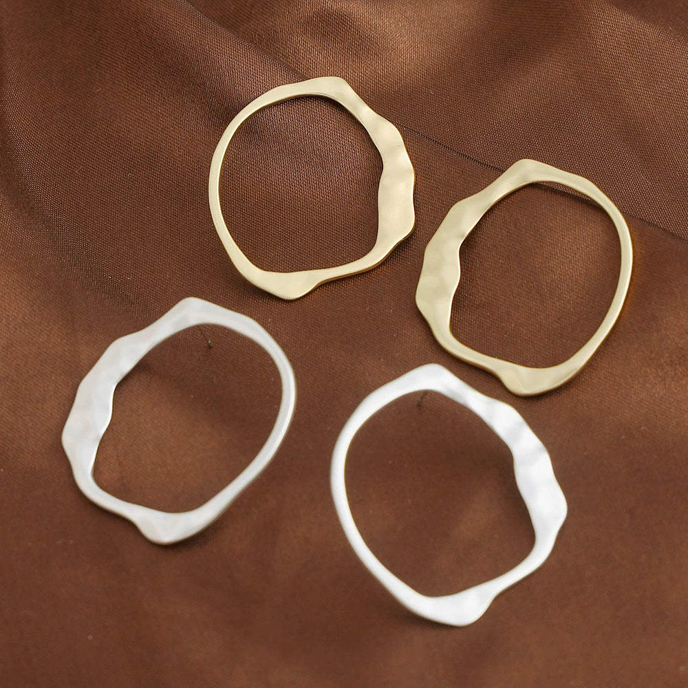 Gold-tone geometric earrings by Yoshan, detail view 3