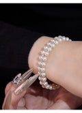 Pearl drop earrings by Yoshan