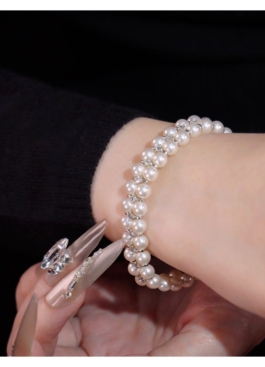 Pearl drop earrings by Yoshan