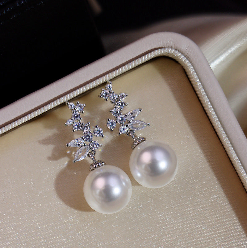 Pearl drop earrings by Yoshan