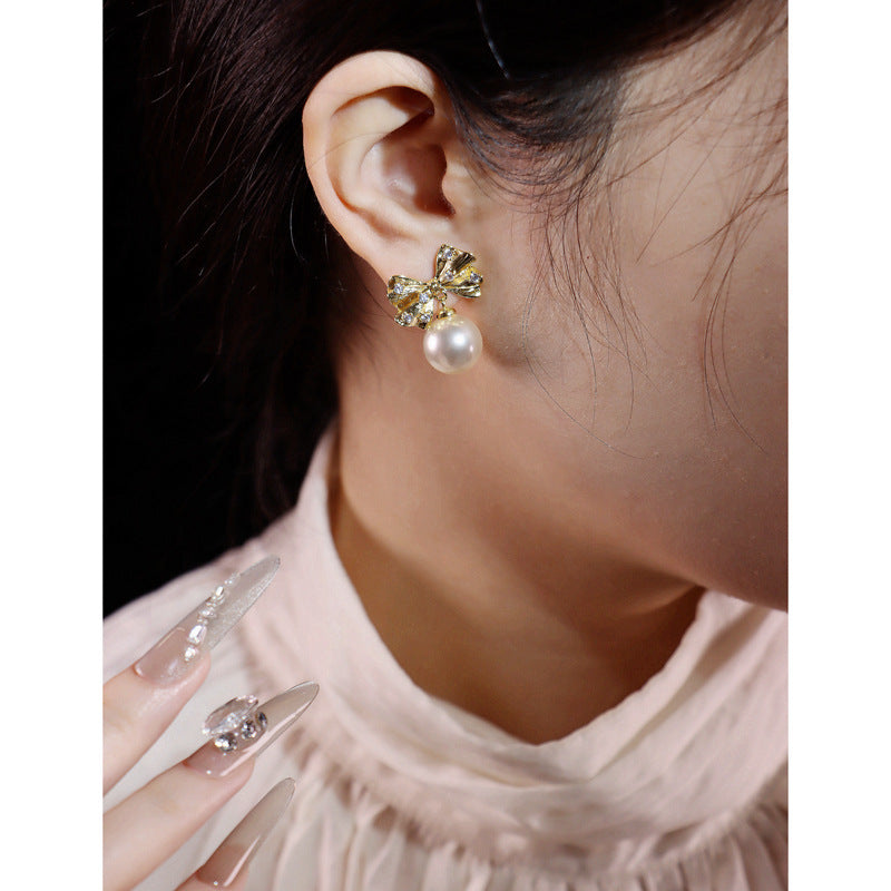 Pearl bow drop earrings by Yoshan, detail view 4