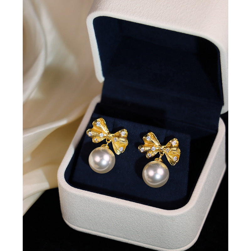 Pearl bow drop earrings by Yoshan, detail view 5