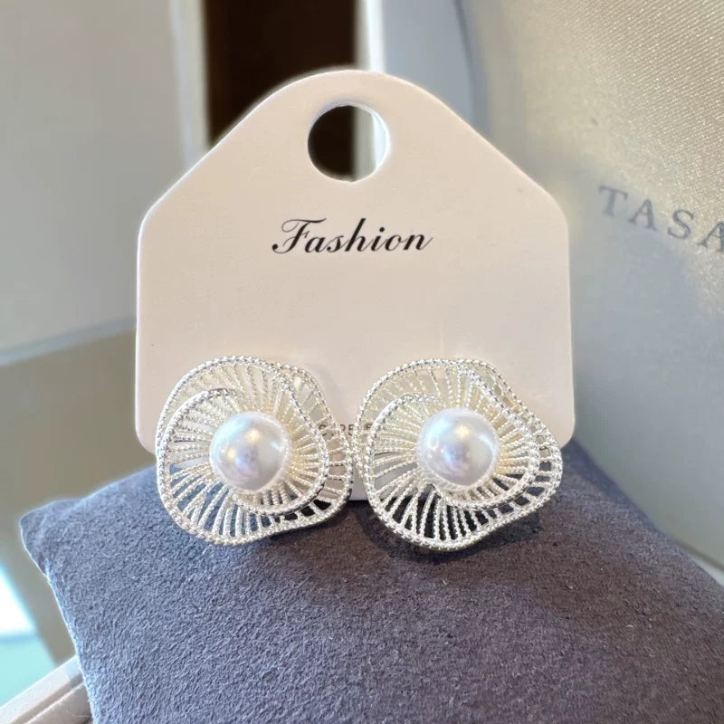 Pearl stud earrings by Yoshan, detail view 11