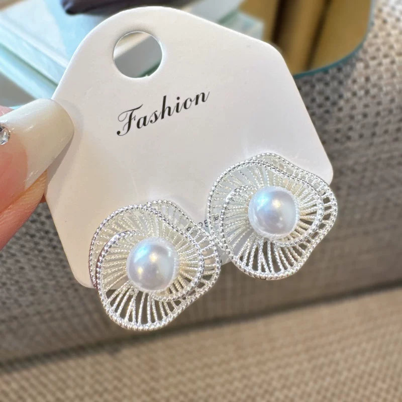 Pearl stud earrings by Yoshan, detail view 9