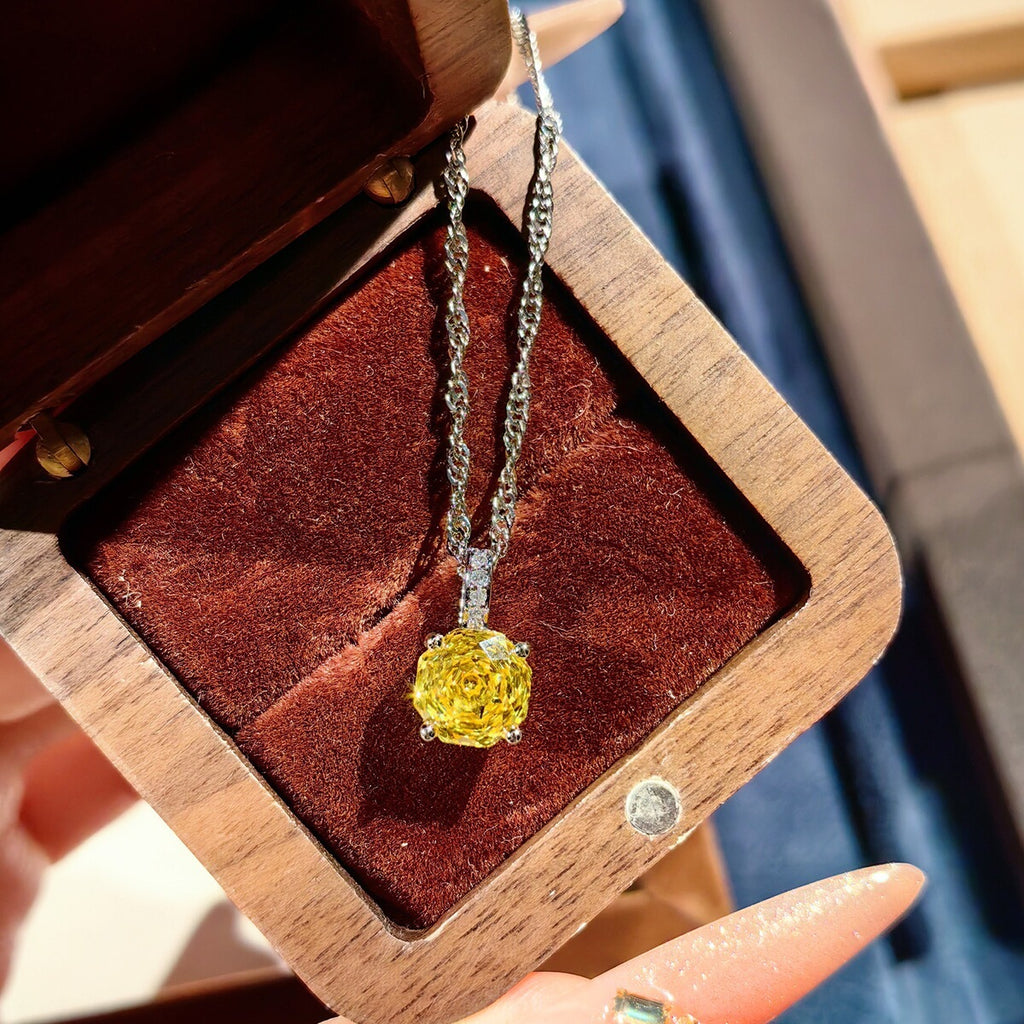 Yellow stud earrings by Yoshan