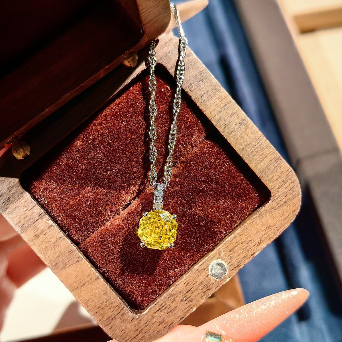 Yellow stud earrings by Yoshan