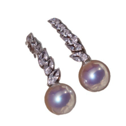 Pearl stud earrings by Yoshan, detail view 7