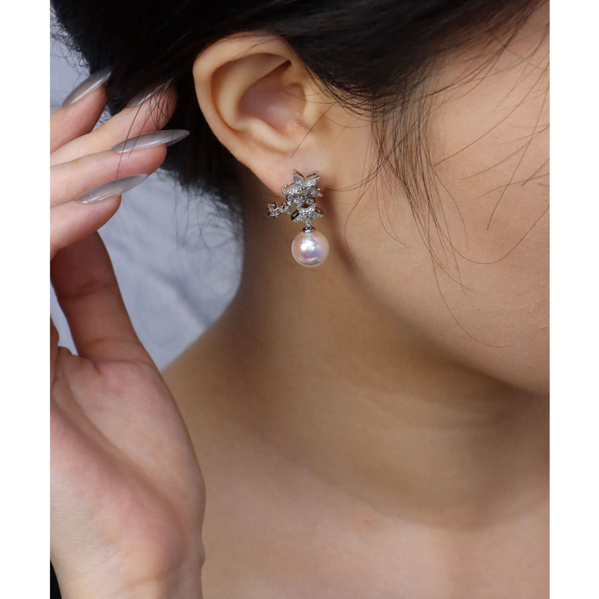 Pink pearl stud earrings by Yoshan