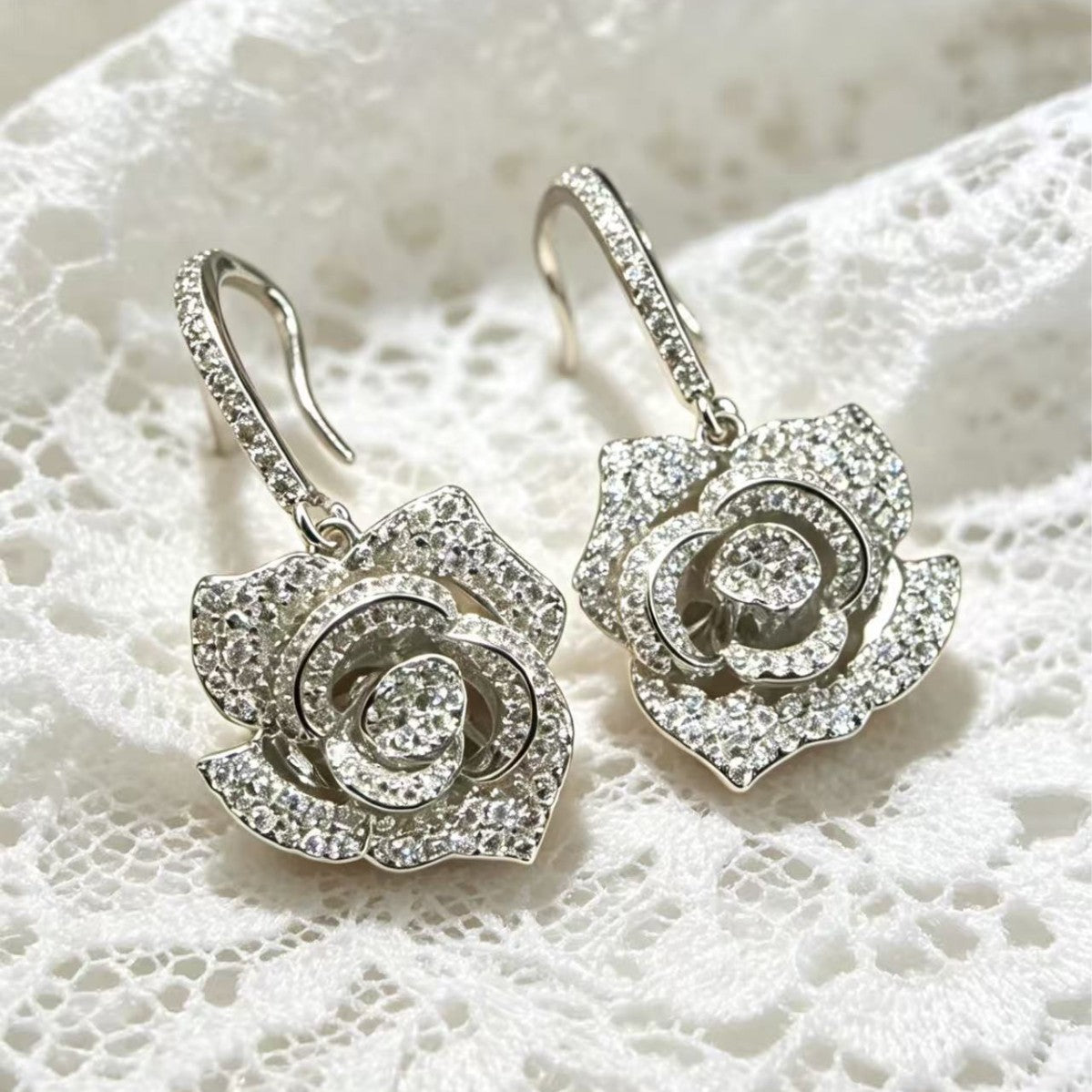 Cubic zirconia floral earrings by Yoshan, detail view 2