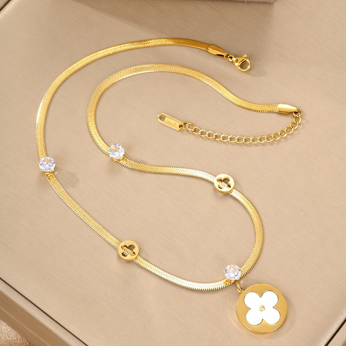 Gold pendant necklace by Yoshan