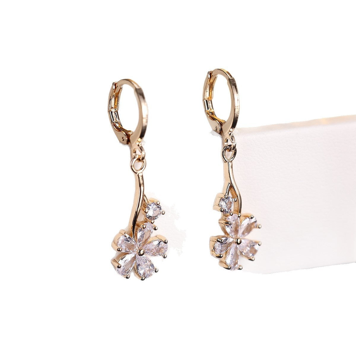 Cubic zirconia floral stud earrings by Yoshan, detail view 7