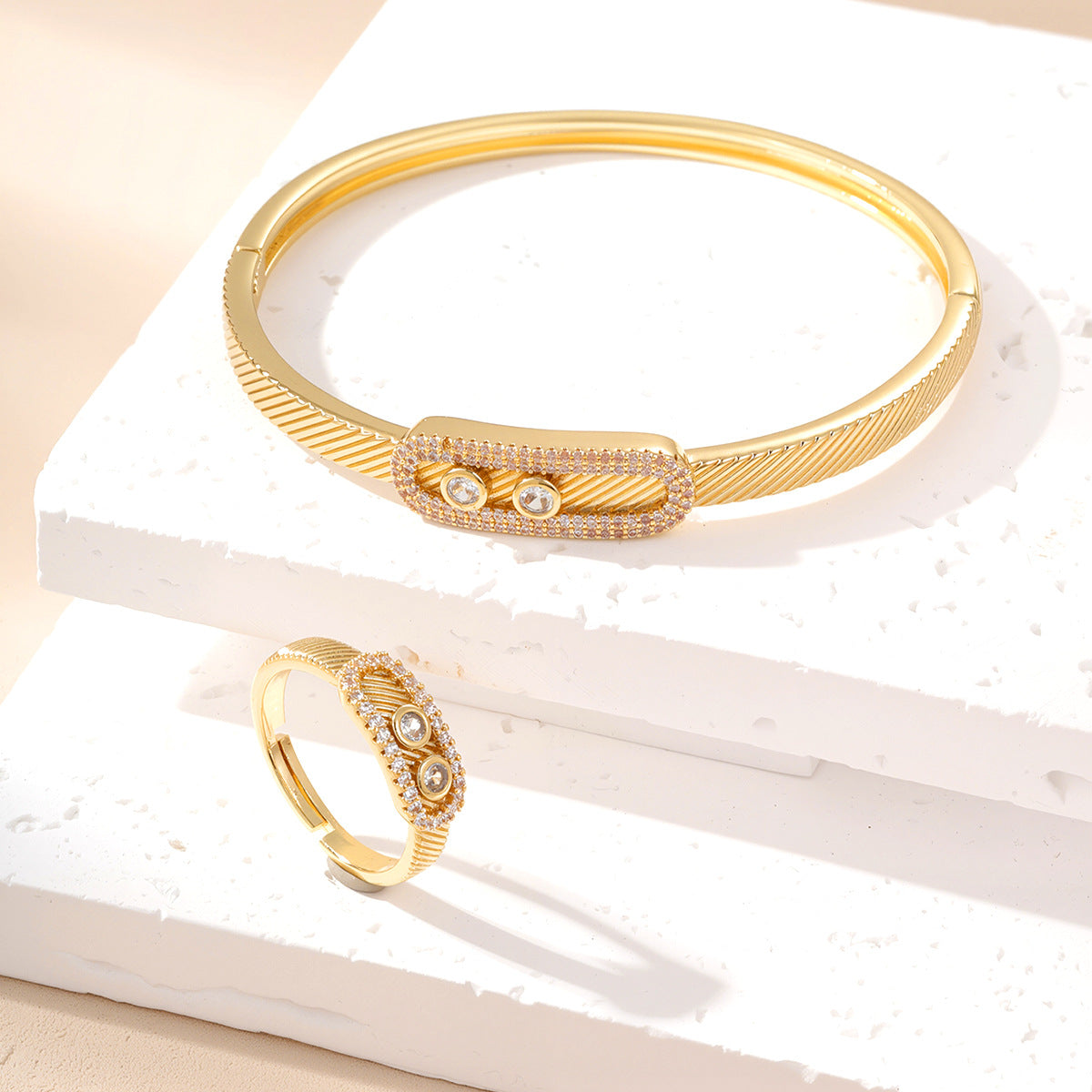 Gold cubic zirconia geometric cuff bracelet by Yoshan