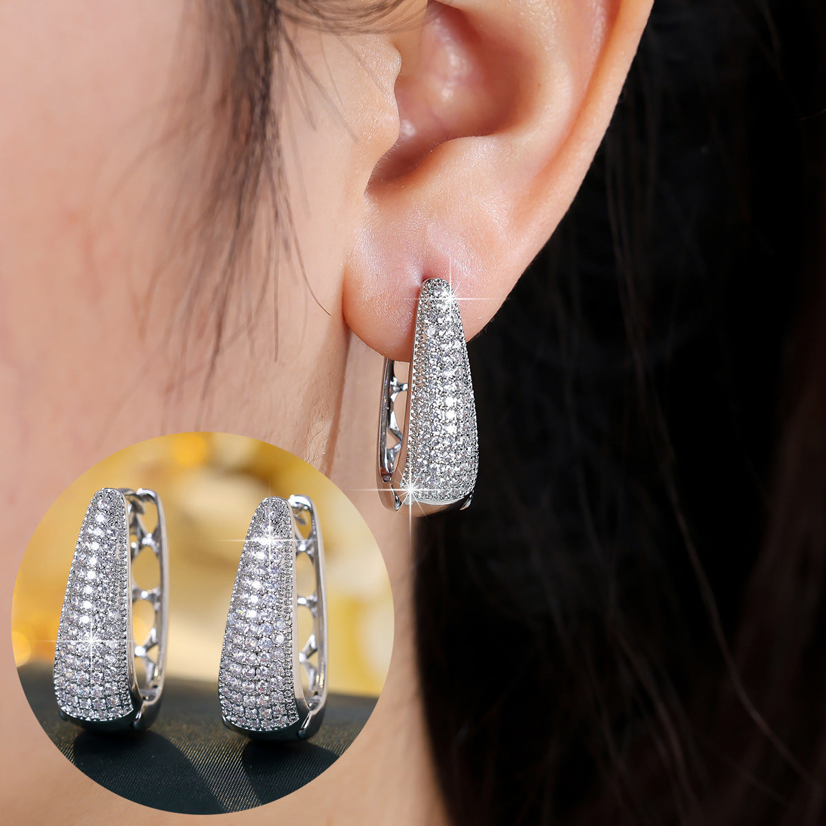 Silver cubic zirconia cutout stud earrings by Yoshan