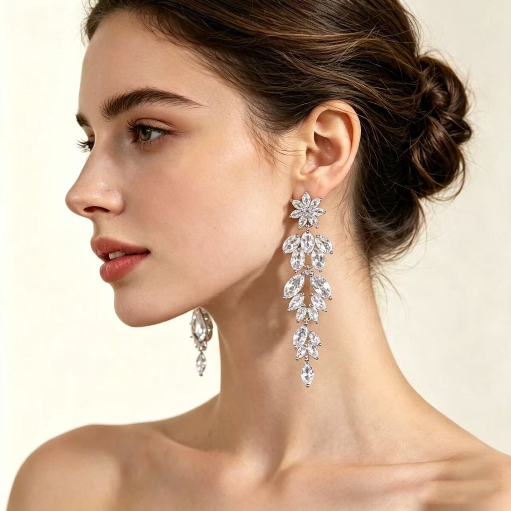 Cubic zirconia floral stud earrings by Yoshan