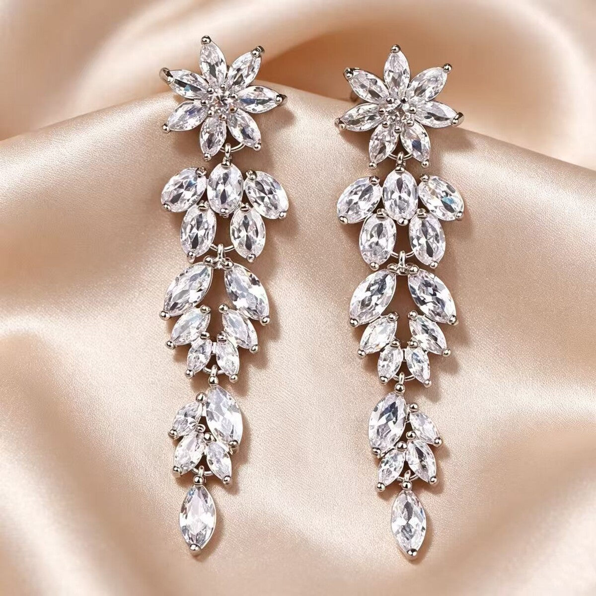 Cubic zirconia floral stud earrings by Yoshan, detail view 3