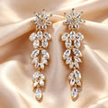 Gold cubic zirconia floral stud earrings by Yoshan, view 2