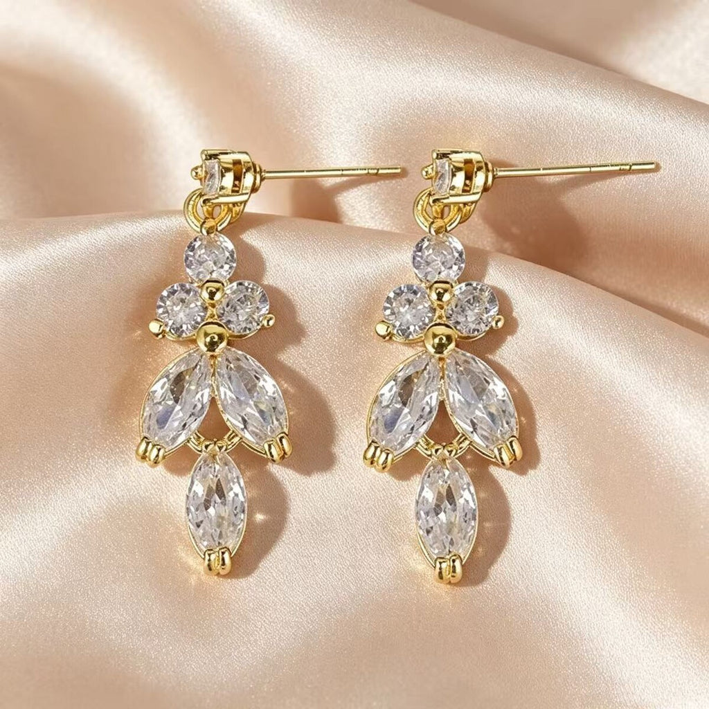 Gold cubic zirconia earrings by Yoshan, view 2
