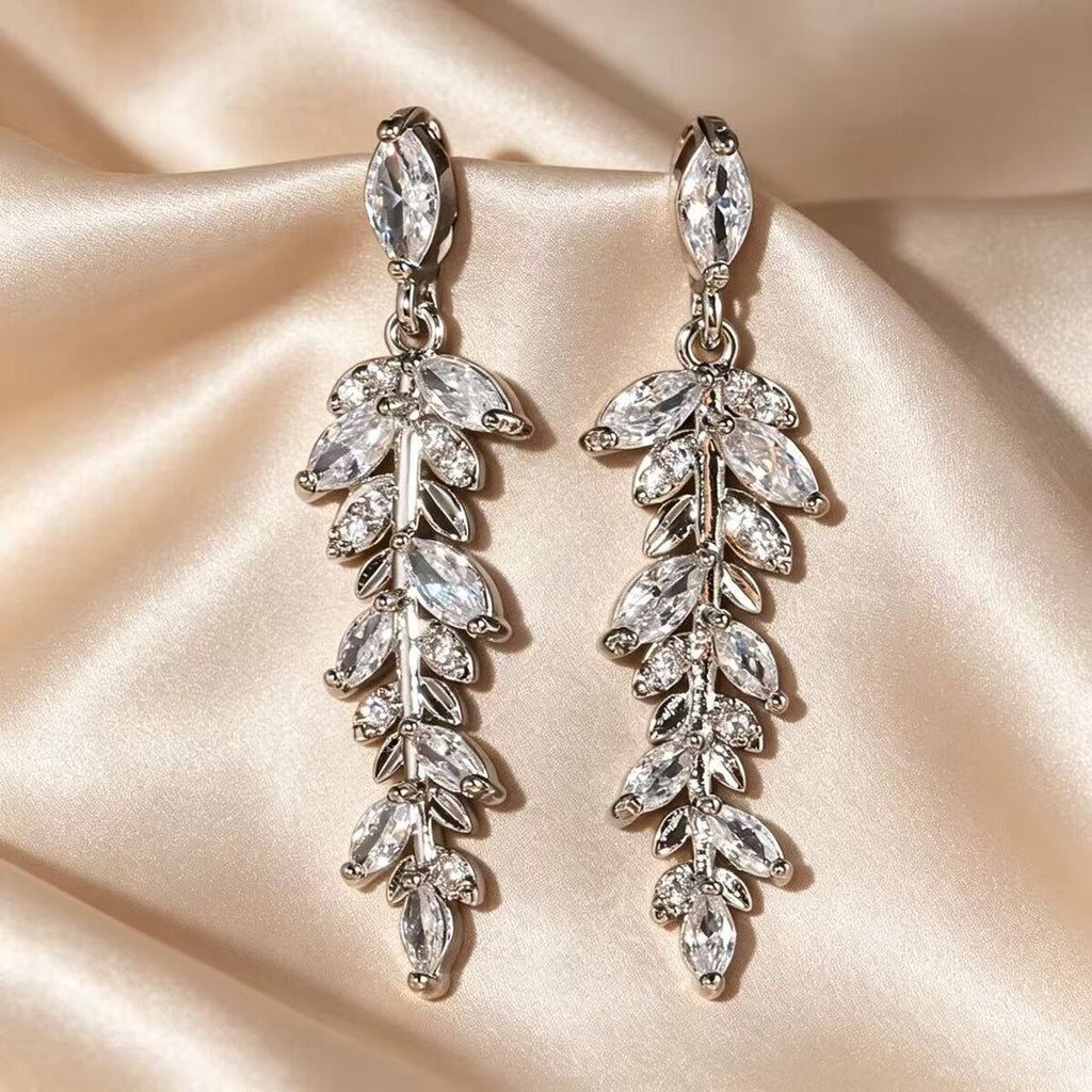 Cubic zirconia tassel stud earrings by Yoshan