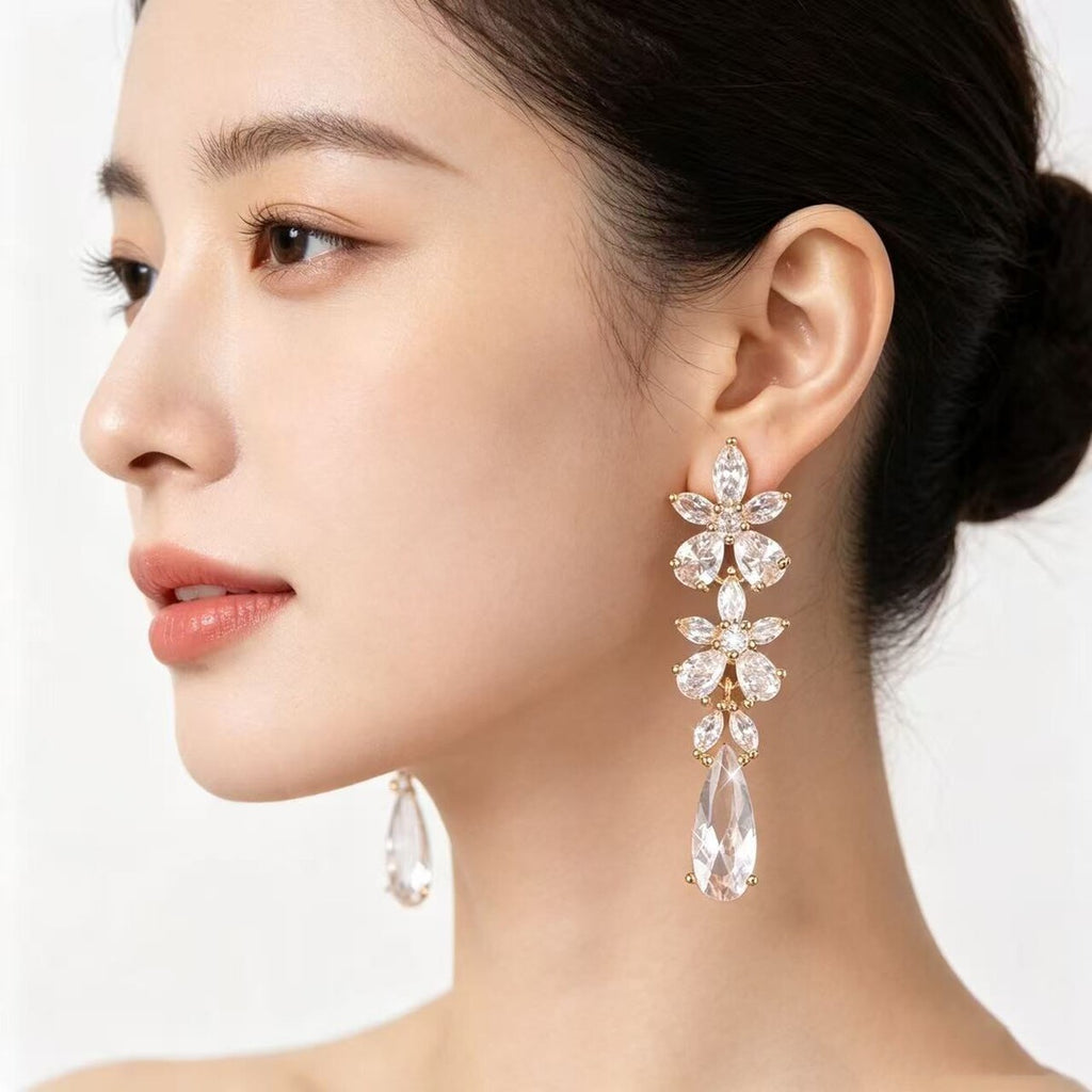 Cubic zirconia stud earrings by Yoshan