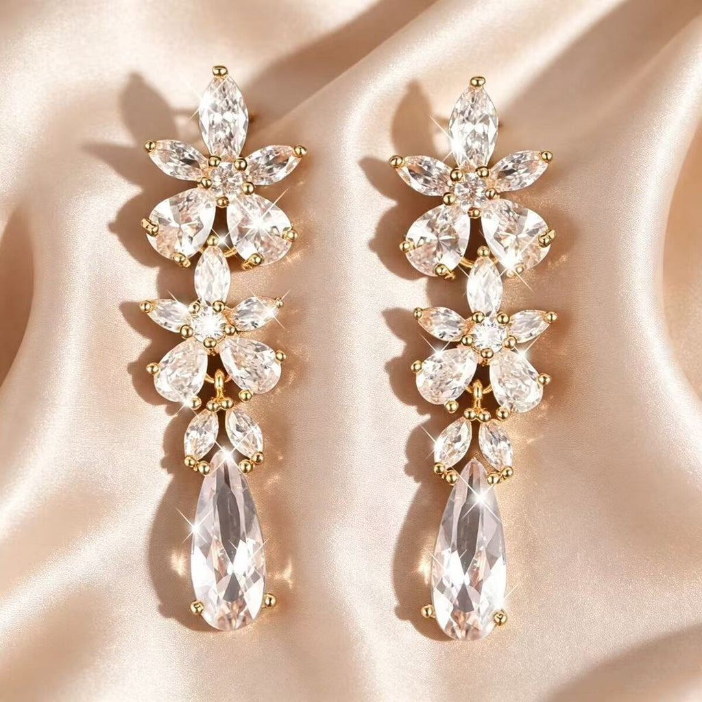 Gold cubic zirconia stud earrings by Yoshan, view 2