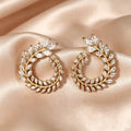 Gold cubic zirconia earrings by Yoshan, view 2