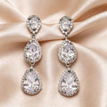 Silver cubic zirconia tassel stud earrings by Yoshan