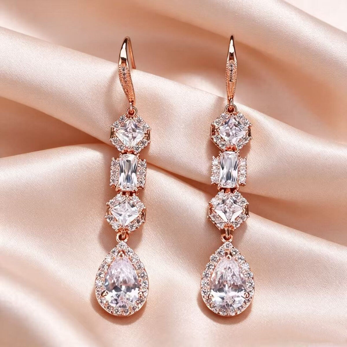 Gold cubic zirconia stud earrings by Yoshan