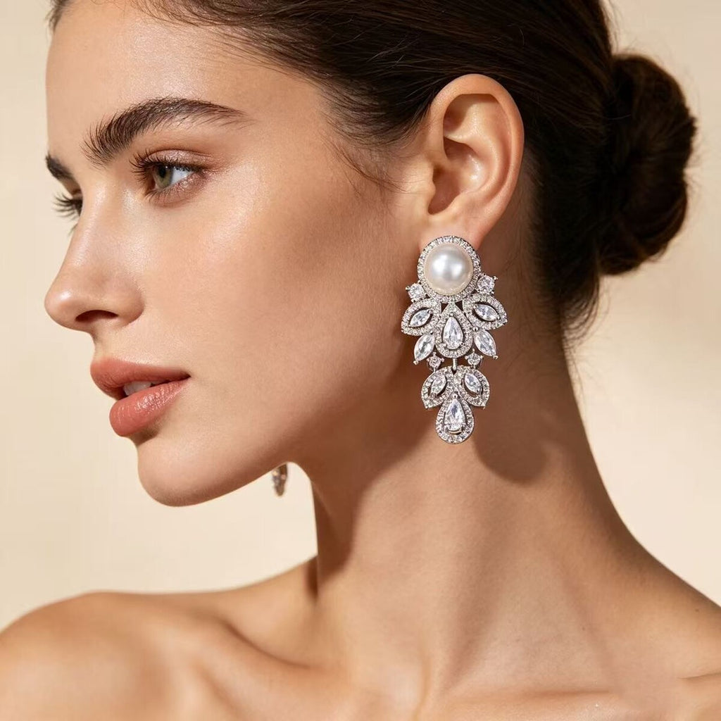 Cubic zirconia stud earrings by Yoshan