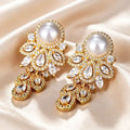Gold cubic zirconia stud earrings by Yoshan