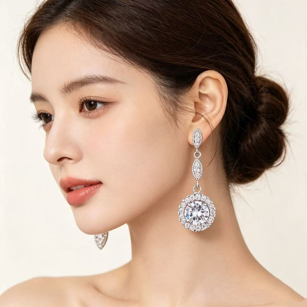 Cubic zirconia stud earrings by Yoshan