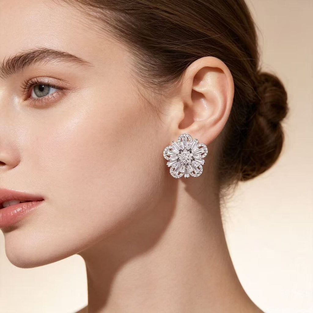 Cubic zirconia floral stud earrings by Yoshan