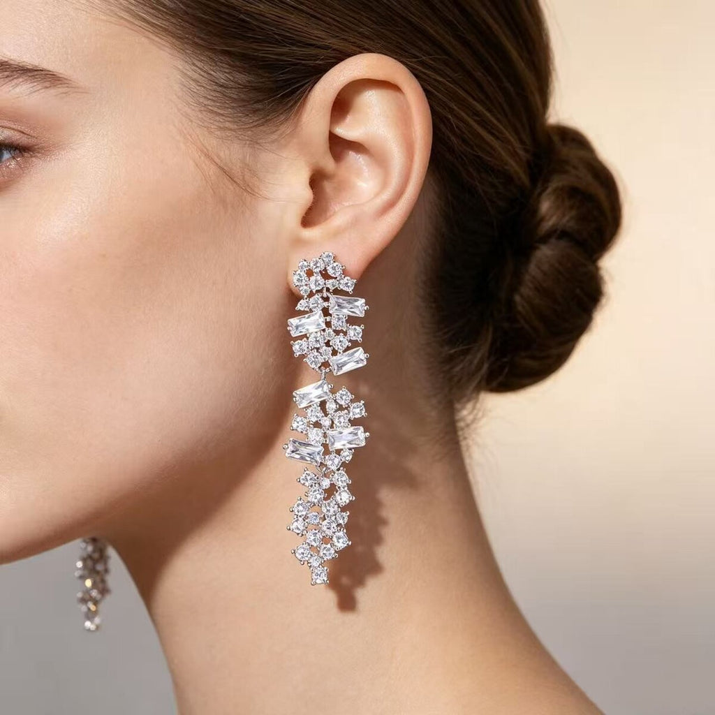 Cubic zirconia tassel stud earrings by Yoshan
