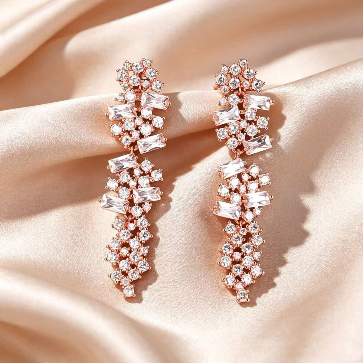 Gold cubic zirconia tassel stud earrings by Yoshan