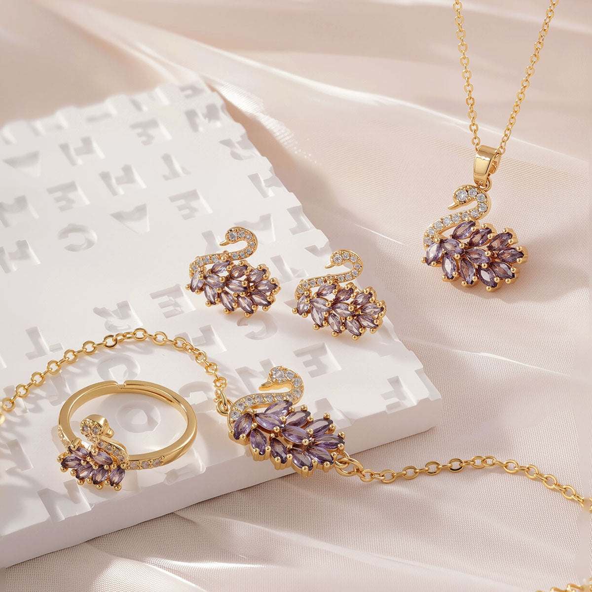 Gold Purple cubic zirconia earrings by Yoshan
