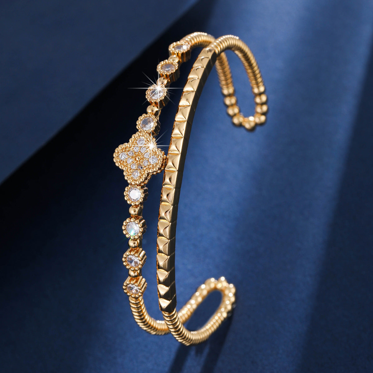 Gold floral cuff bracelet by Yoshan