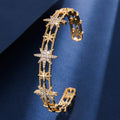 Gold cutout jewelry set by Yoshan