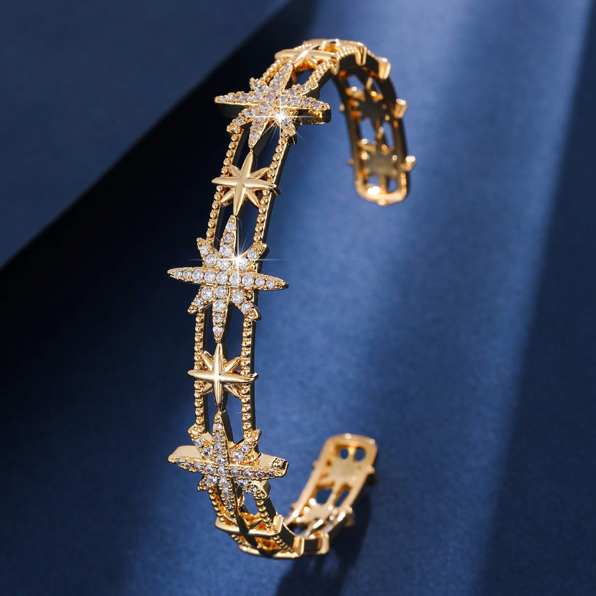 Gold cutout jewelry set by Yoshan