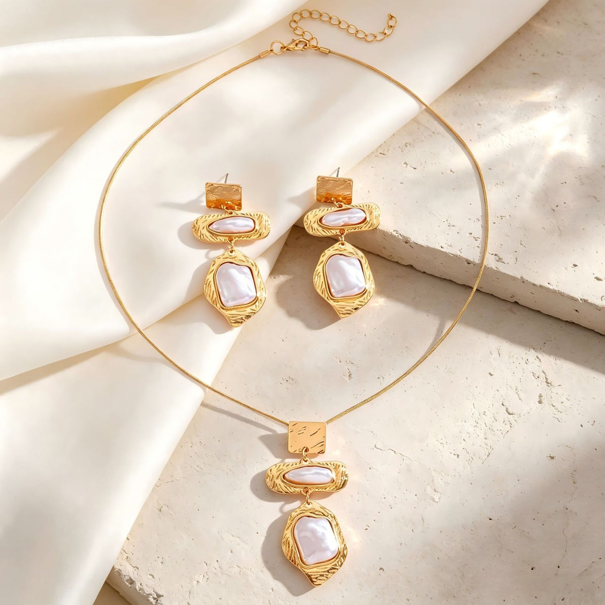 Pearl geometric earrings by Yoshan