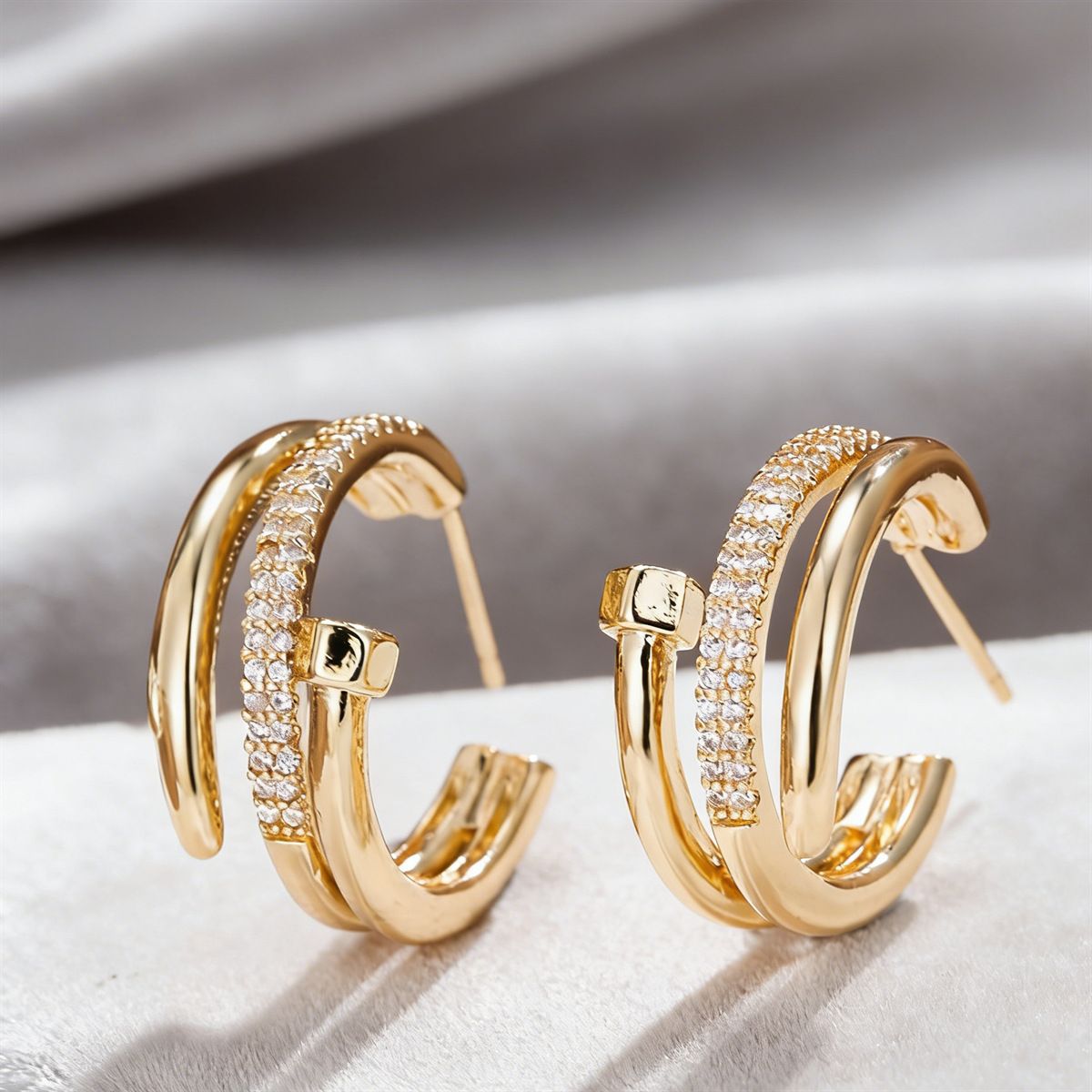 Gold cubic zirconia cuff bracelet by Yoshan