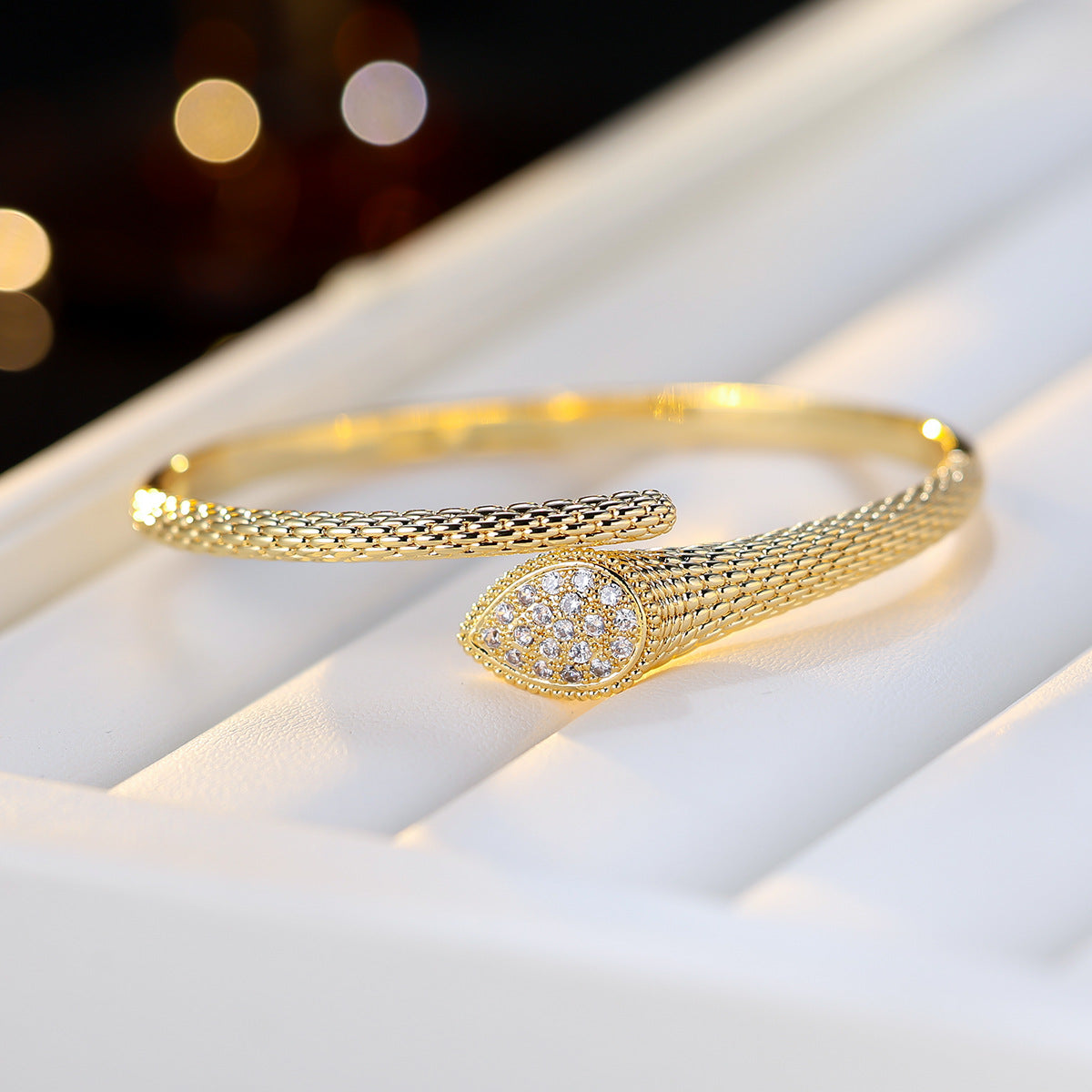 Gold minimalist cuff bracelet by Yoshan, view 2