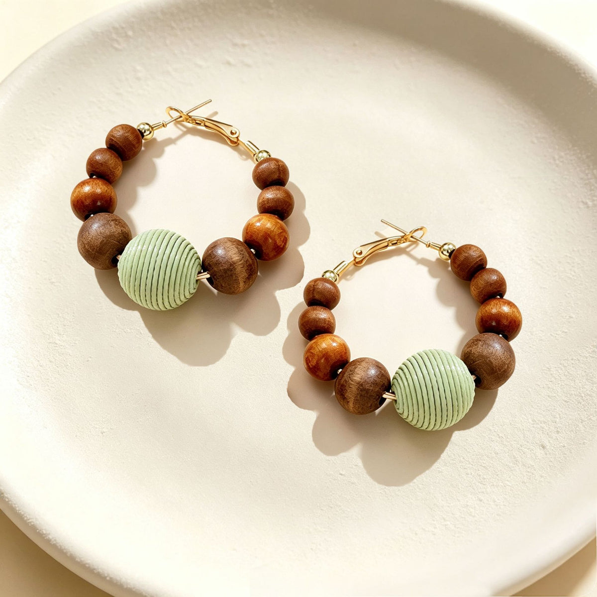 Brown Green geometric drop earrings by Yoshan