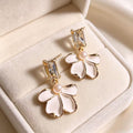 Gold tassel earrings by Yoshan