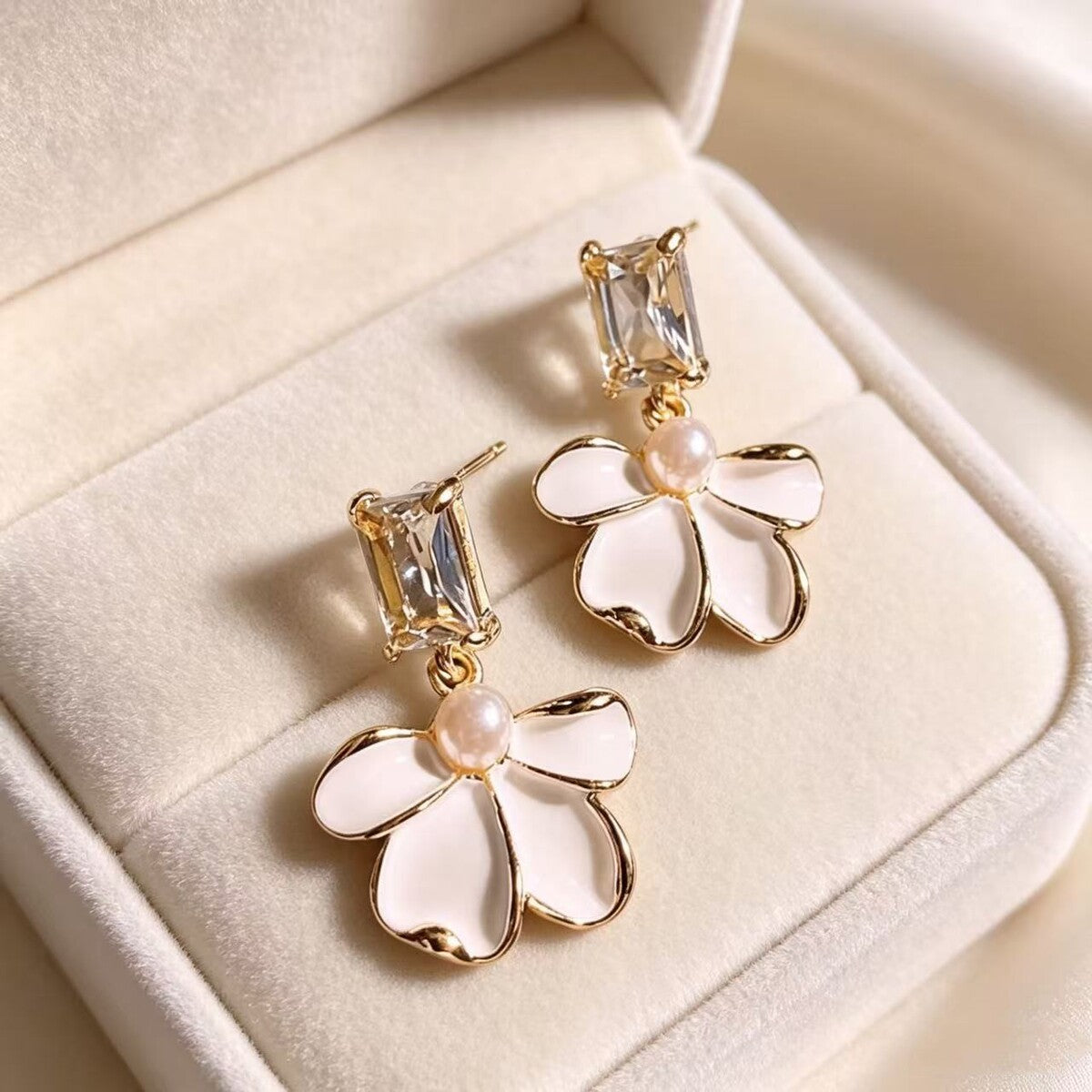 Gold tassel earrings by Yoshan