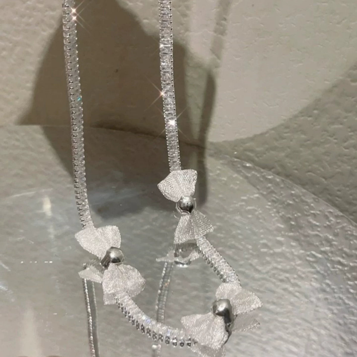Pearl bow pendant necklace by Yoshan, detail view 10