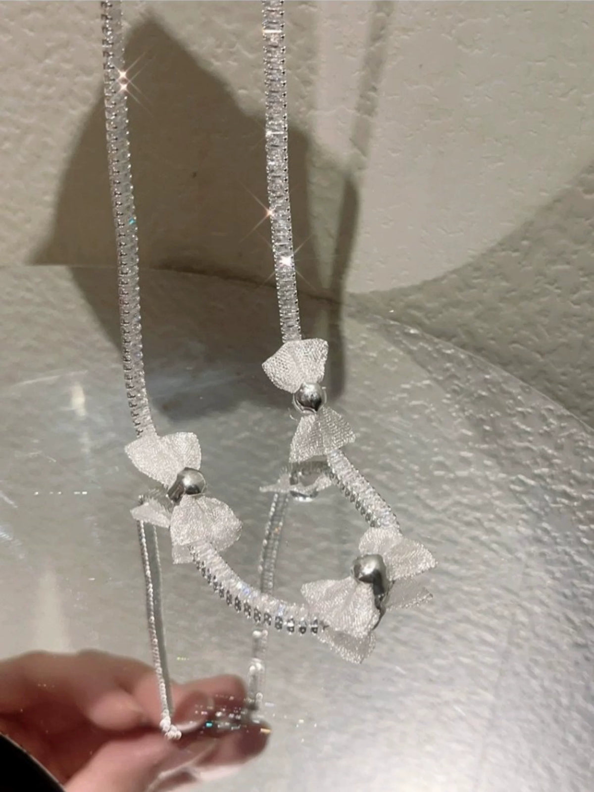 Pearl bow pendant necklace by Yoshan, detail view 5