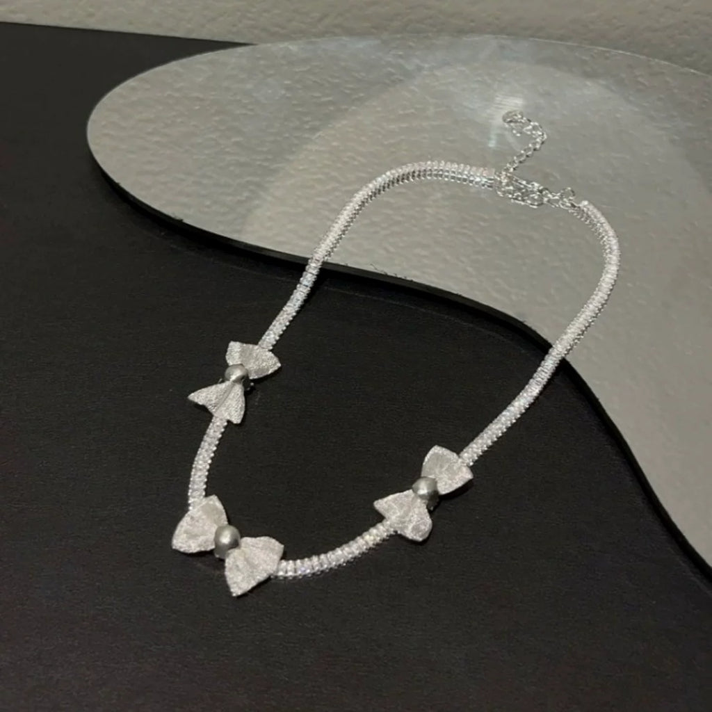 Pearl bow pendant necklace by Yoshan, detail view 7