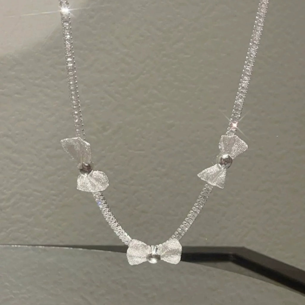 Pearl bow pendant necklace by Yoshan, detail view 9