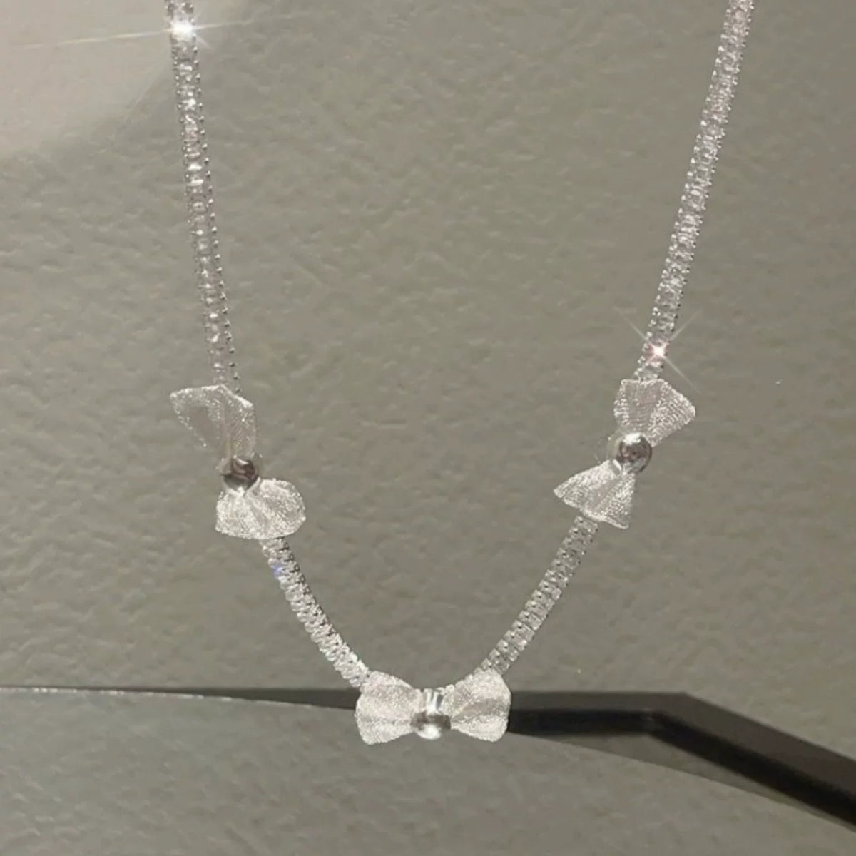 Pearl bow pendant necklace by Yoshan, detail view 9
