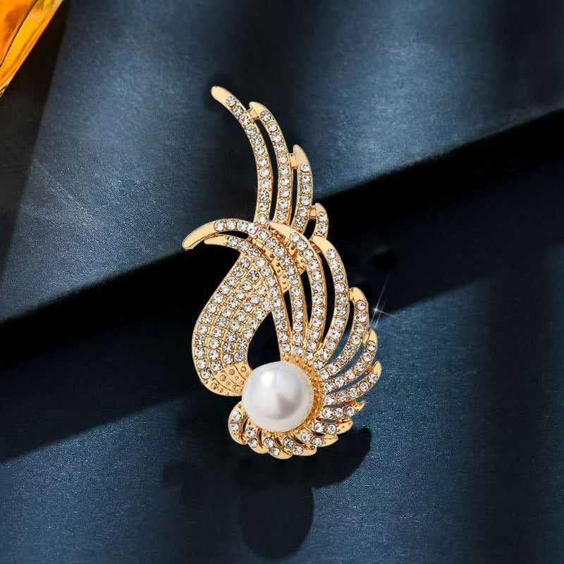 Gold faux pearl jewelry set by Yoshan